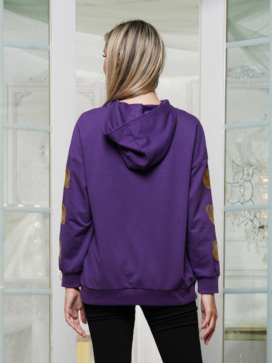 Half-zip hoodie with a relaxed fit and football sequin embroidery