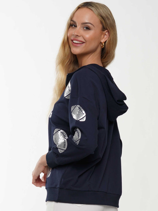 Half-zip hoodie with a relaxed fit and football sequin embroidery
