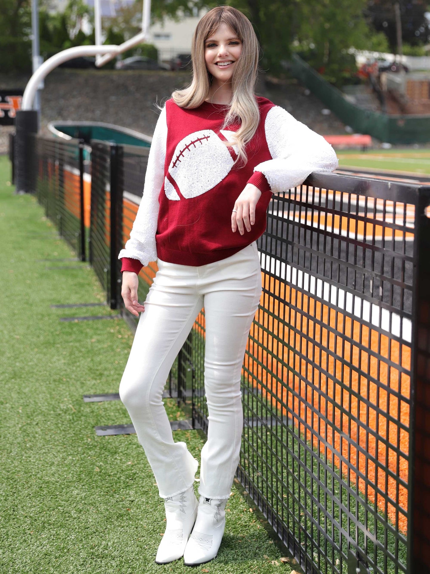 Sequin sleeve knit top with sequin football