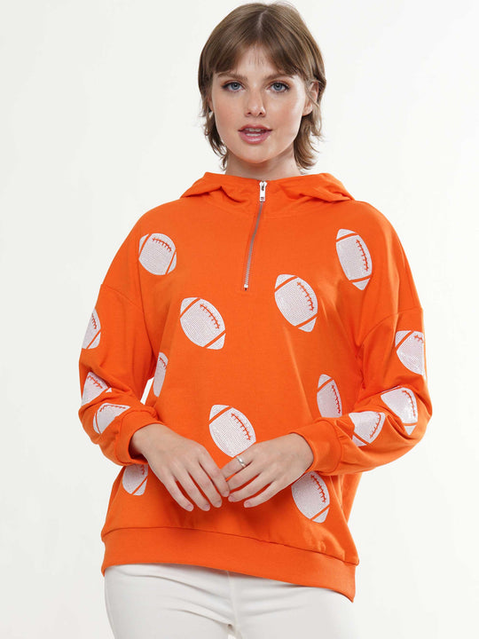 Half-zip hoodie with a relaxed fit and football sequin embroidery