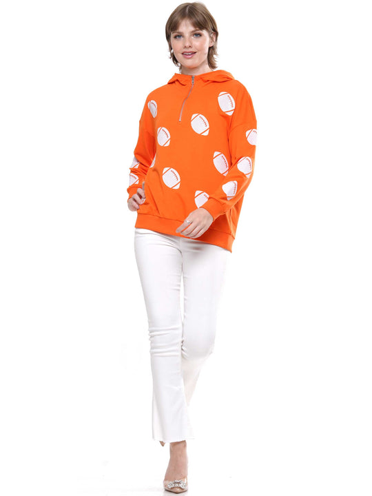 Half-zip hoodie with a relaxed fit and football sequin embroidery